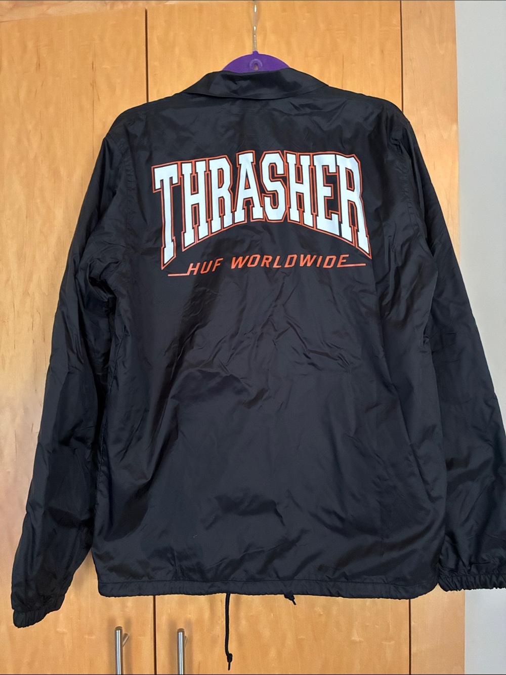 Thrasher Black Windbreaker with White and Red Back Logo